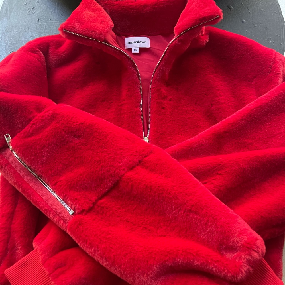 Cropped , faux fur, pullover. Never worn. Great for fall!